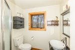 Full bathroom with shower stall